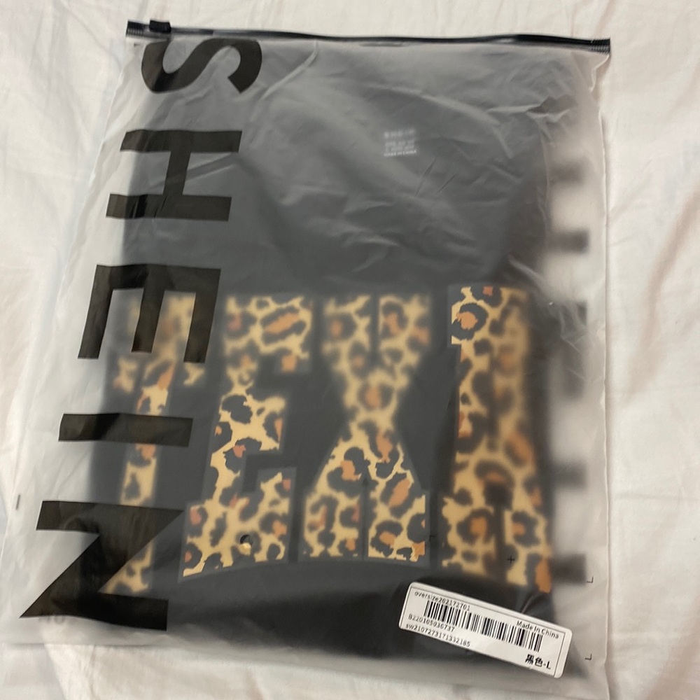 This is a black tshirt that say Texas on it